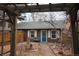 Brick building with blue door and landscaped backyard at 3610 N Clay St, Denver, CO 80211