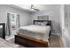 Bright bedroom featuring a comfortable bed and ample natural light at 2371 Locust St, Denver, CO 80207