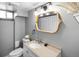 Basement bathroom with updated vanity and fixtures at 2371 Locust St, Denver, CO 80207