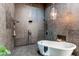 Spa-like bathroom with soaking tub and walk-in shower at 11922 W 77Th Dr, Arvada, CO 80005