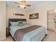 Bright bedroom with ceiling fan and access to full bathroom at 1020 15Th St # 26A, Denver, CO 80202