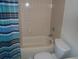 Bathroom with shower/tub combo and striped curtain at 12093 W Cross Dr # 308, Littleton, CO 80127
