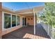 Home deck with access from the house and a view of the backyard at 7846 Village Rd, Parker, CO 80134