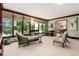 Spacious living room with ample natural light and views of the backyard at 7846 Village Rd, Parker, CO 80134