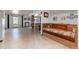 Finished basement with a built-in bench and tiled floor at 7846 Village Rd, Parker, CO 80134
