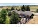 Back of the house with deck and patio area at 7846 Village Rd, Parker, CO 80134