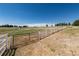 View of a large pasture with a gate and fencing at 7846 Village Rd, Parker, CO 80134