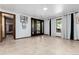 Spacious basement room with tiled floor and large window at 7846 Village Rd, Parker, CO 80134