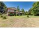 Ranch style home with a large yard and mature trees at 7846 Village Rd, Parker, CO 80134