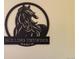 Metal sign with the words Rolling Thunder Ranch at 7846 Village Rd, Parker, CO 80134