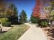 Walking path with scenic views of lake and community at 13674 Plaster Cir, Broomfield, CO 80023