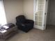 Cozy office space with leather chair and French doors at 13674 Plaster Cir, Broomfield, CO 80023