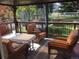Relaxing patio with wicker furniture and a view of the backyard at 13674 Plaster Cir, Broomfield, CO 80023