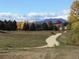 Community path with scenic views of homes and mountains at 13674 Plaster Cir, Broomfield, CO 80023