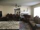 Gathering room with fireplace and comfortable seating at 13674 Plaster Cir, Broomfield, CO 80023