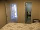 Bedroom with access to another bedroom and bathroom at 13674 Plaster Cir, Broomfield, CO 80023