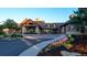 Community clubhouse with inviting landscaping and stonework at 8006 Trinity Peak Ln, Castle Rock, CO 80108