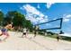 Beach volleyball court with players and spectators at 8006 Trinity Peak Ln, Castle Rock, CO 80108