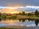 Peaceful lakefront community with beautiful homes and sunset views at 8006 Trinity Peak Ln, Castle Rock, CO 80108