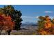Spectacular mountain views from the community with vibrant fall foliage at 8006 Trinity Peak Ln, Castle Rock, CO 80108