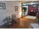 Bright living room with wood floors and stylish seating at 3550 S Harlan St # 313, Denver, CO 80235