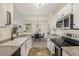 Kitchen with granite countertops and stainless steel appliances at 9510 E Florida Ave # 2052, Denver, CO 80247