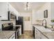 Modern kitchen with stainless steel appliances and granite countertops at 9510 E Florida Ave # 2052, Denver, CO 80247