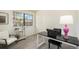 Home office with a writing desk and comfortable seating at 9510 E Florida Ave # 2052, Denver, CO 80247