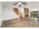 Living room featuring a stone fireplace and sliding glass doors at 326 Wright St # 304, Lakewood, CO 80228