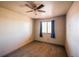 Simple bedroom with carpet, ceiling fan, and window coverings at 341 N 18Th Ct, Brighton, CO 80601