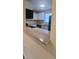 Modern kitchen with teal appliances and a breakfast bar at 1940 Quince St, Denver, CO 80220