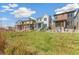 New homes community with a variety of architectural styles and landscaping at 21278 E 63Rd Dr, Aurora, CO 80019