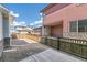Landscaped backyard with a wooden fence and patio at 21278 E 63Rd Dr, Aurora, CO 80019