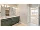 Spacious bathroom with double sinks, and view of bedroom at 21278 E 63Rd Dr, Aurora, CO 80019