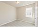 Bright and airy bedroom with carpet flooring and a window at 21278 E 63Rd Dr, Aurora, CO 80019