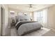 Spacious bedroom with large windows and neutral decor at 21278 E 63Rd Dr, Aurora, CO 80019