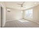 Spacious bedroom with ceiling fan and carpet flooring at 21278 E 63Rd Dr, Aurora, CO 80019