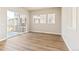 Bright dining room with wood-look floors and lots of natural light at 21278 E 63Rd Dr, Aurora, CO 80019