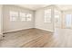 Dining Room with wood-look floors and access to other rooms at 21278 E 63Rd Dr, Aurora, CO 80019