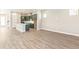 Open concept kitchen with a large island and modern cabinetry at 21278 E 63Rd Dr, Aurora, CO 80019
