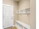 Convenient mudroom with built-in bench and storage at 21278 E 63Rd Dr, Aurora, CO 80019