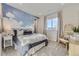 Bright bedroom featuring a cloud mural and cozy bedding at 13830 Emerald Lake St, Parker, CO 80138