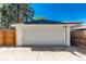 Detached garage with single door and ample parking space at 1160 S Monroe St, Denver, CO 80210