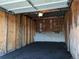 Empty garage with shelving and concrete floor at 140 E Highline Cir # 203, Centennial, CO 80122