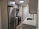 Modern kitchen with stainless steel appliances and quartz countertops at 140 E Highline Cir # 203, Centennial, CO 80122