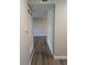 Clean and bright hallway with laminate wood flooring at 140 E Highline Cir # 203, Centennial, CO 80122