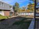 Brick building with attached garages and landscaping at 140 E Highline Cir # 203, Centennial, CO 80122