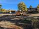 Community playground with playset and benches at 140 E Highline Cir # 203, Centennial, CO 80122