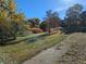 Landscaped grounds with trees and walking paths at 140 E Highline Cir # 203, Centennial, CO 80122