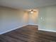 Bright living room featuring light walls and laminate wood flooring at 140 E Highline Cir # 203, Centennial, CO 80122
